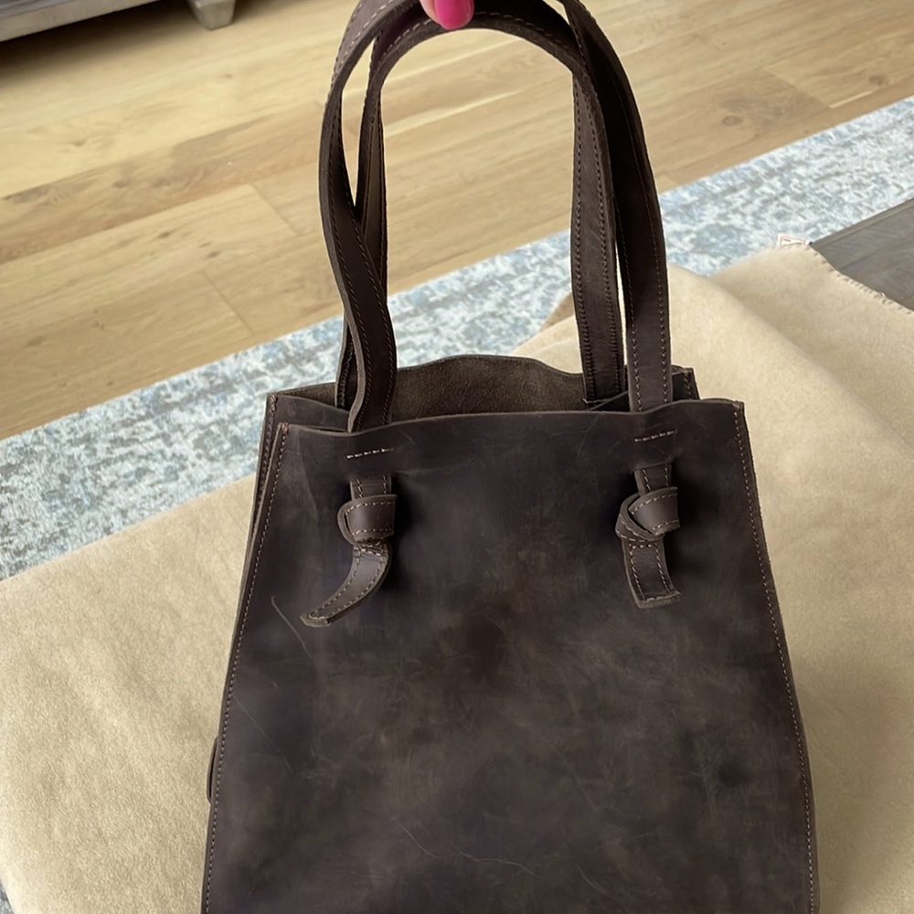 Dark brown leather bag. Never used.
